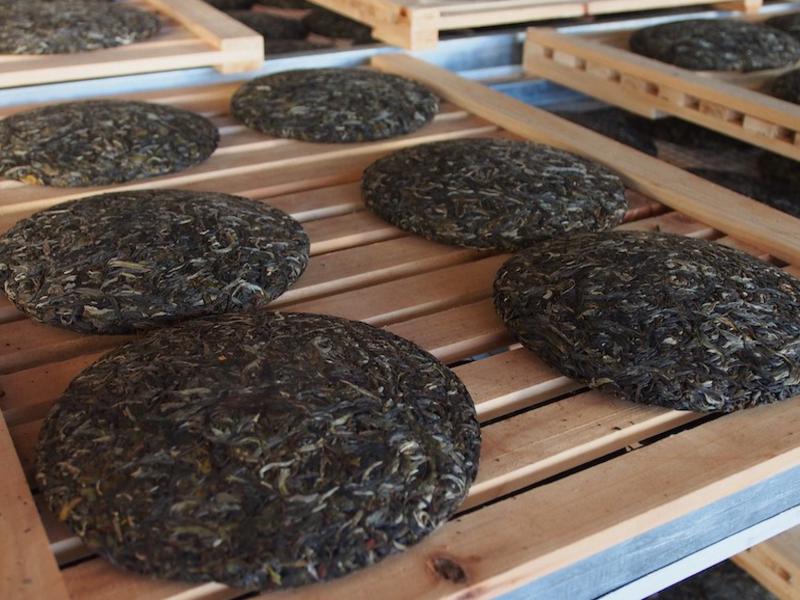 Cakes of pu-erh tea reading for wrapping